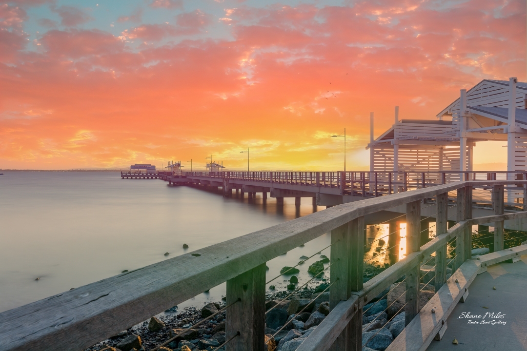 Jetty bathed in sunlight, Woody Point, Queensland Australia.